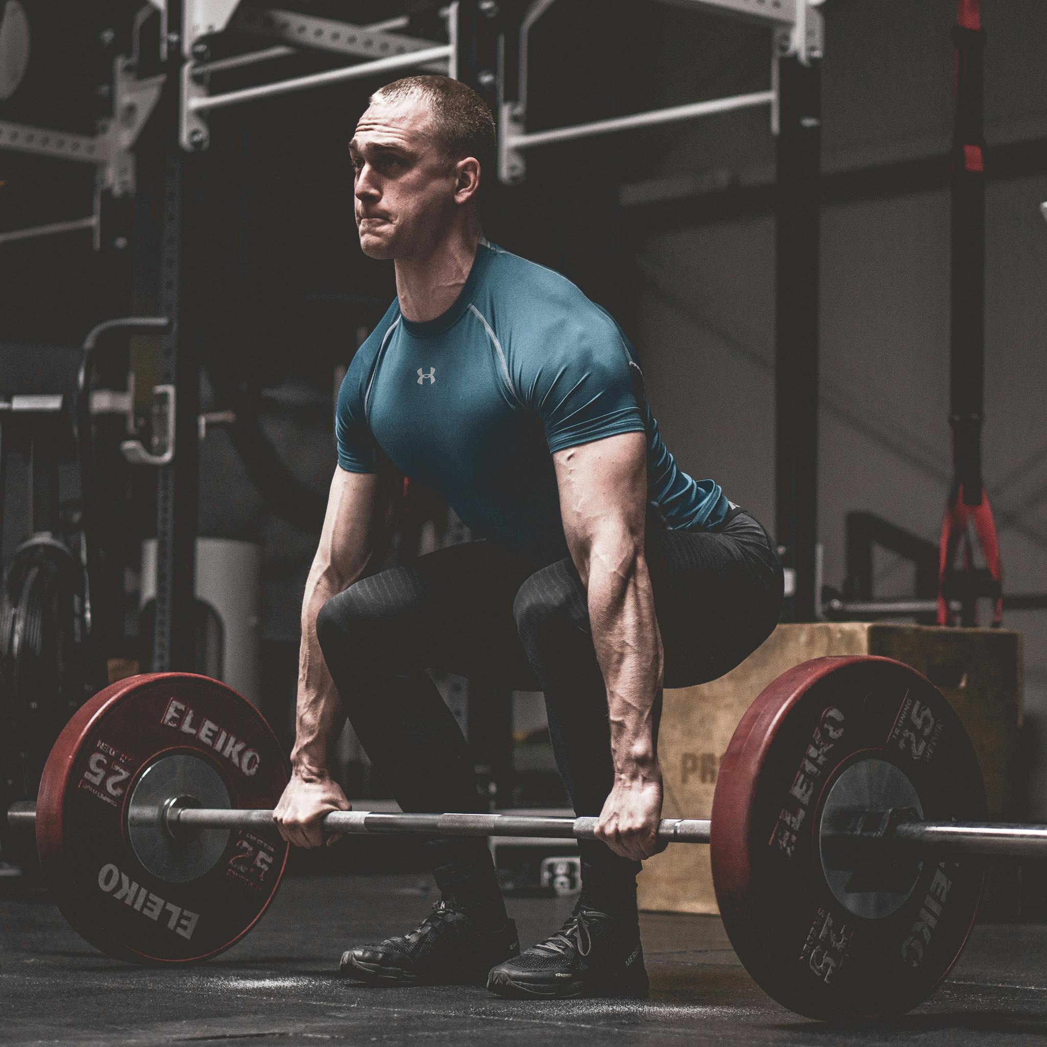 Home Page Man Performing Deadlift