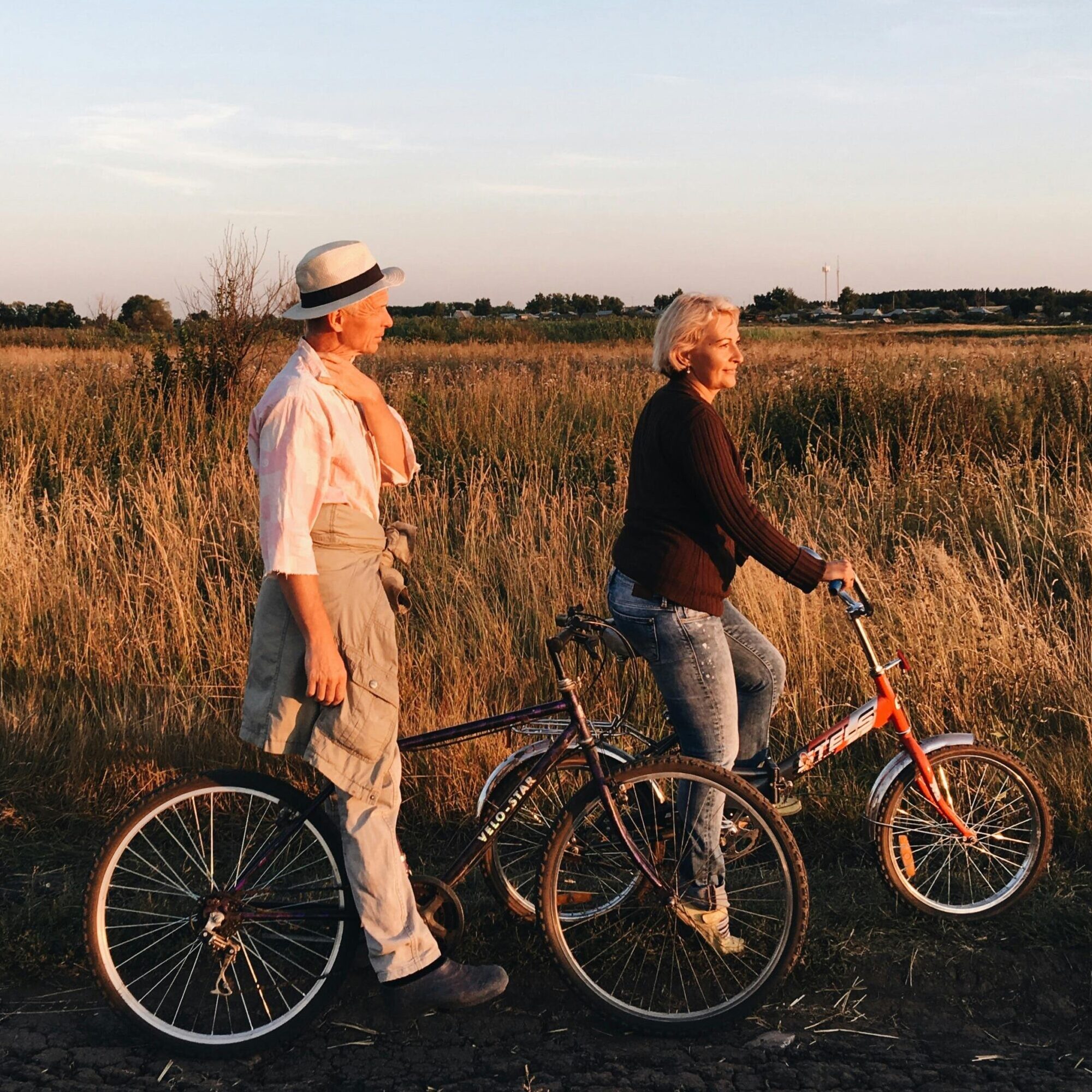 Home Page Older Couple Riding Bikes